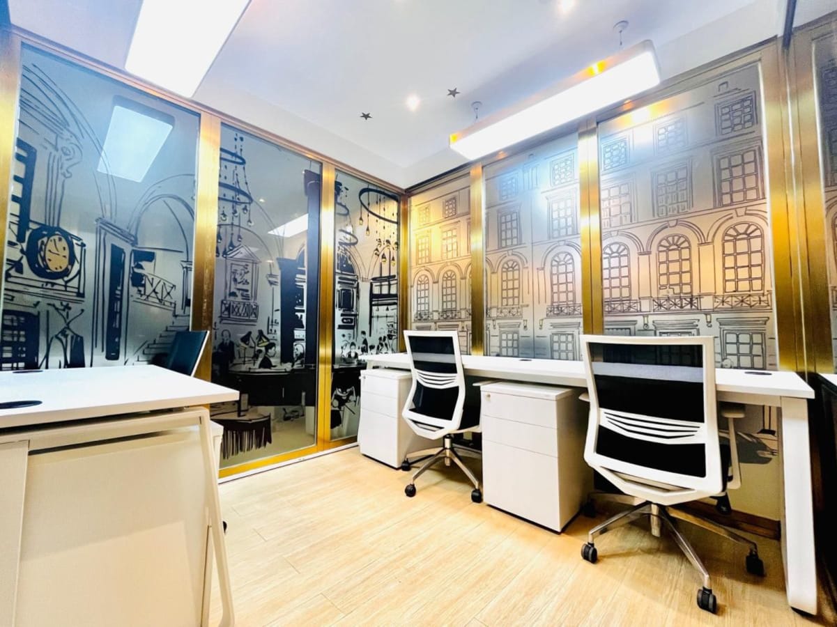 Stylish coworking space with modern desks and chairs. Ideal for collaborative work.