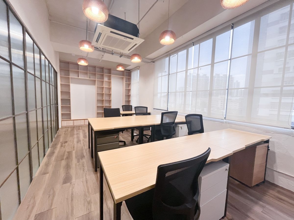 Bright and modern coworking space with ample natural light and ergonomic seating on Wong Chuk Hang Road.