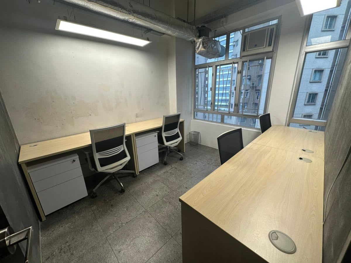 Bright coworking space with modern desks and ergonomic chairs on Watson Road, Hong Kong Island.