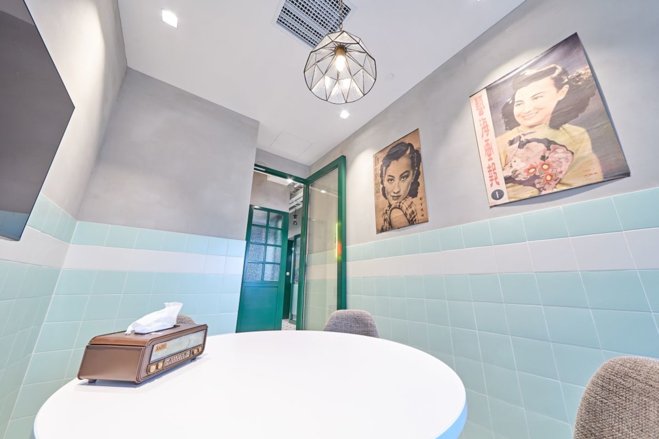 Chic coworking space with modern decor, bright lighting, and artistic flair in New Territories.