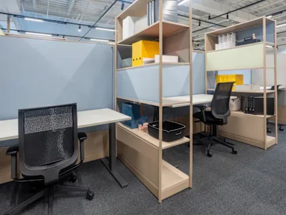 Sleek coworking space with modern desks and ample storage in the Burj Khalifa District.