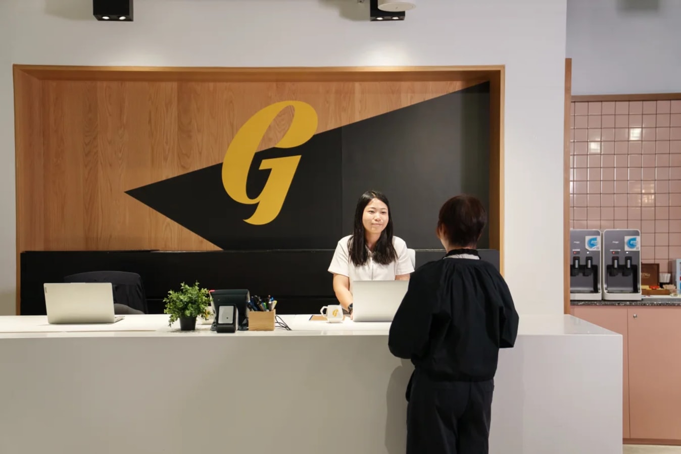 Welcoming reception area in Jaffe Road coworking space. Perfect for client interactions.