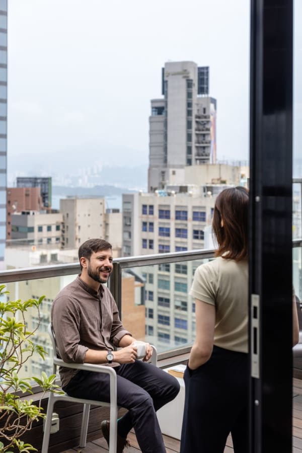 Rooftop terrace with stunning city views, ideal for meetings and networking.