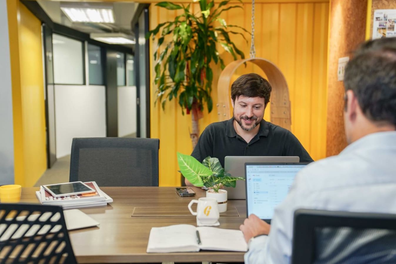 Modern coworking space with bright decor and collaborative desk setup in Lockhart Road.