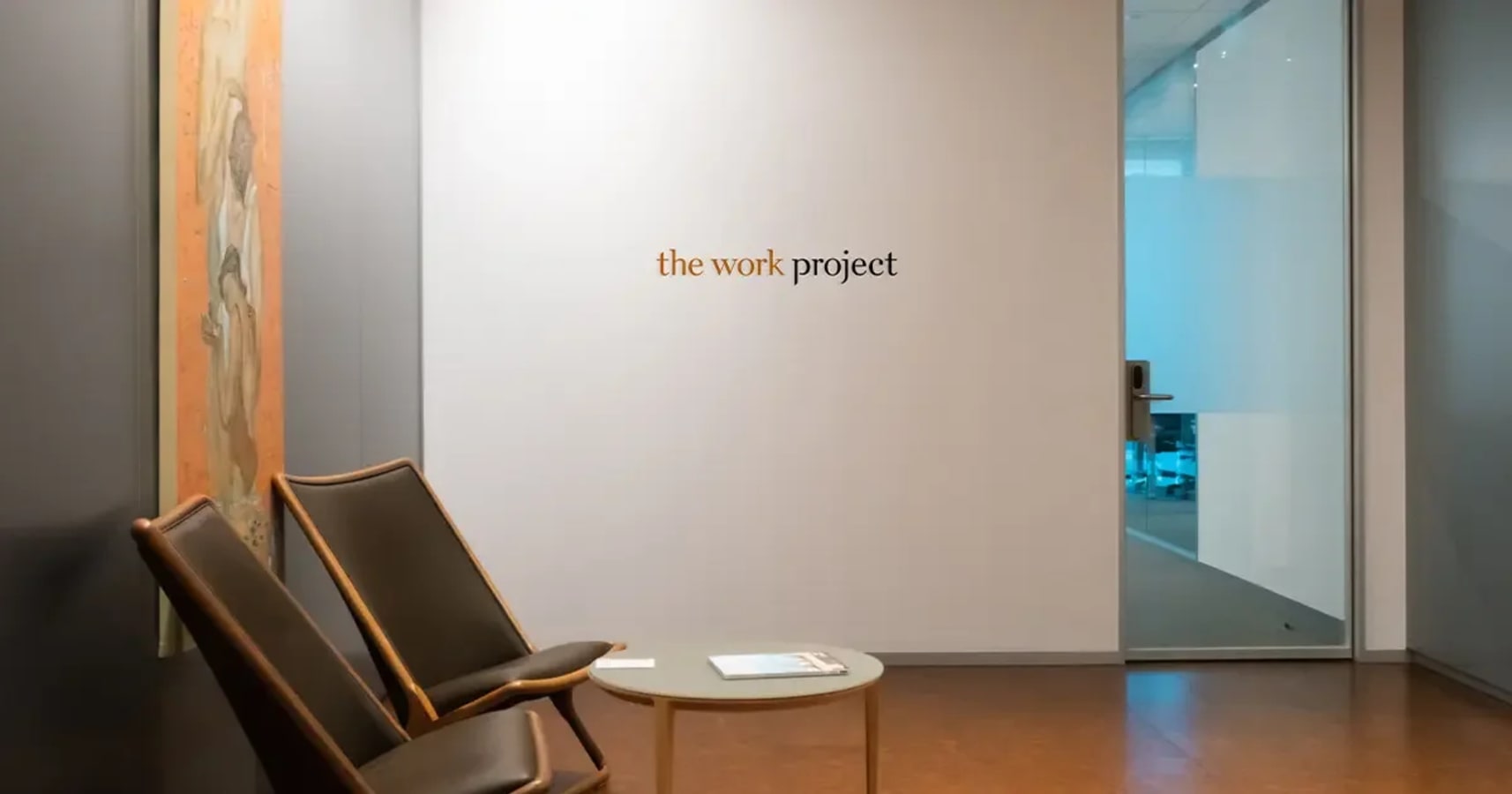 Stylish lounge area with modern seating and artwork in Singapore's flexible coworking space.