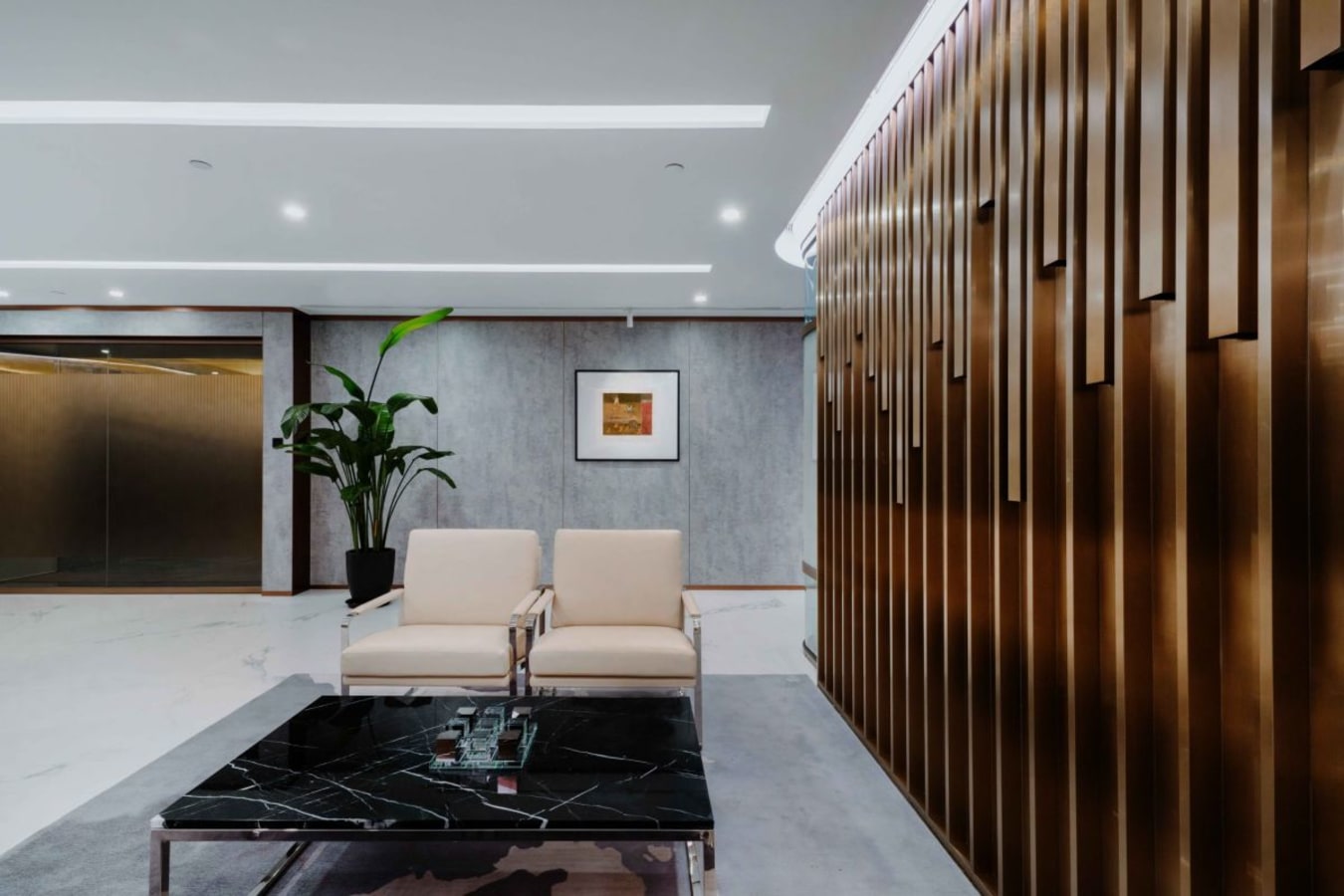 Elegant coworking lounge with modern decor and stylish seating on Garden Road, Hong Kong.