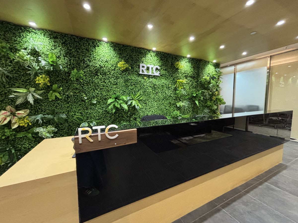 Welcome to our vibrant coworking hub in Kwun Tong. Lush greenery and sleek design await!