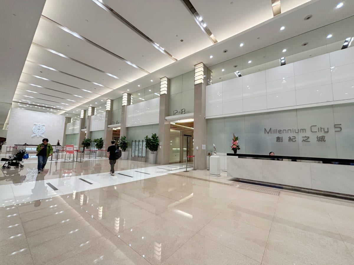 Modern lobby at Millennium City 5, perfect for flexible workspaces in Kwun Tong Road.