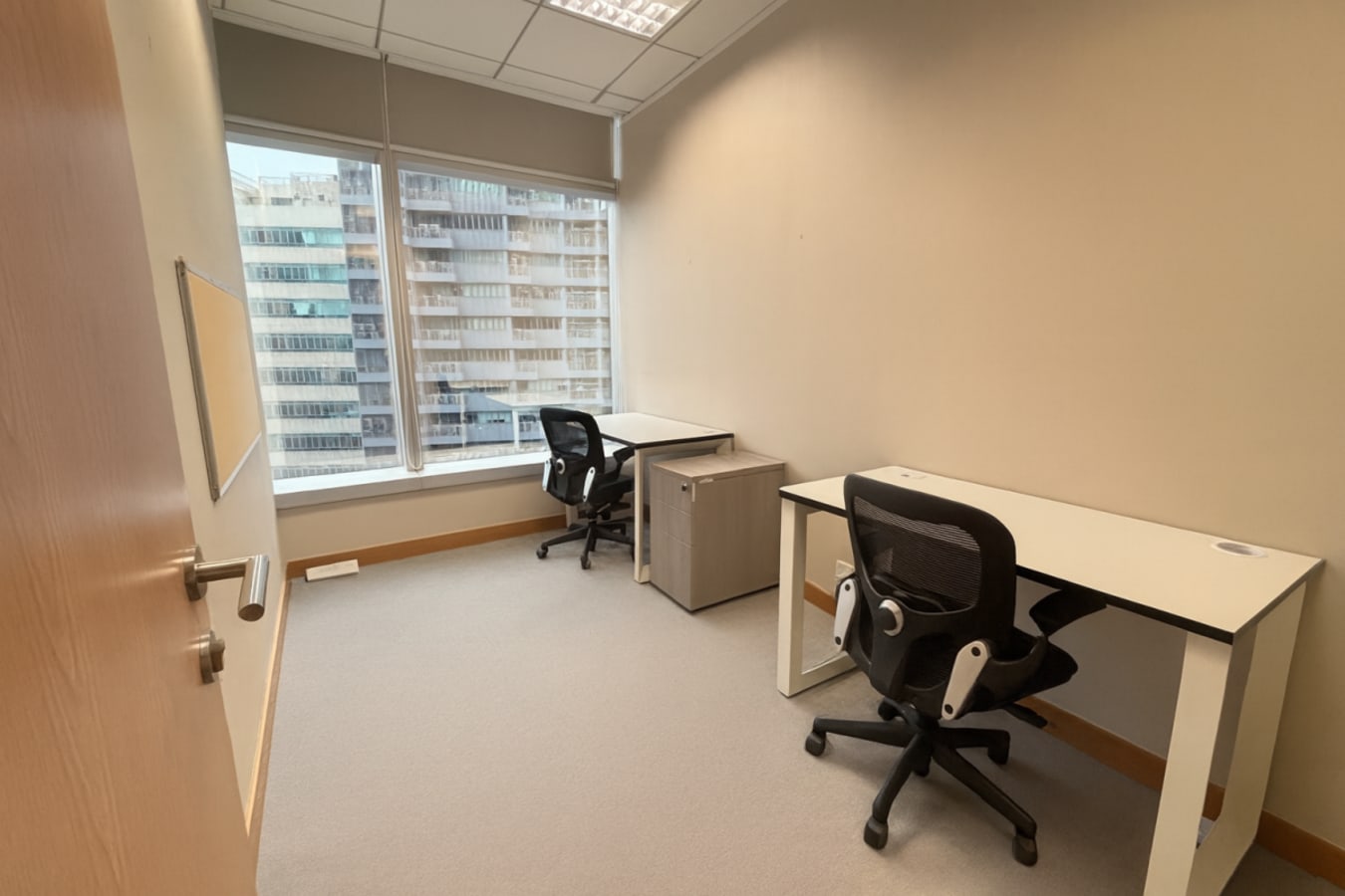 Bright and modern coworking space on Kwun Tong Road. Ideal for productivity.