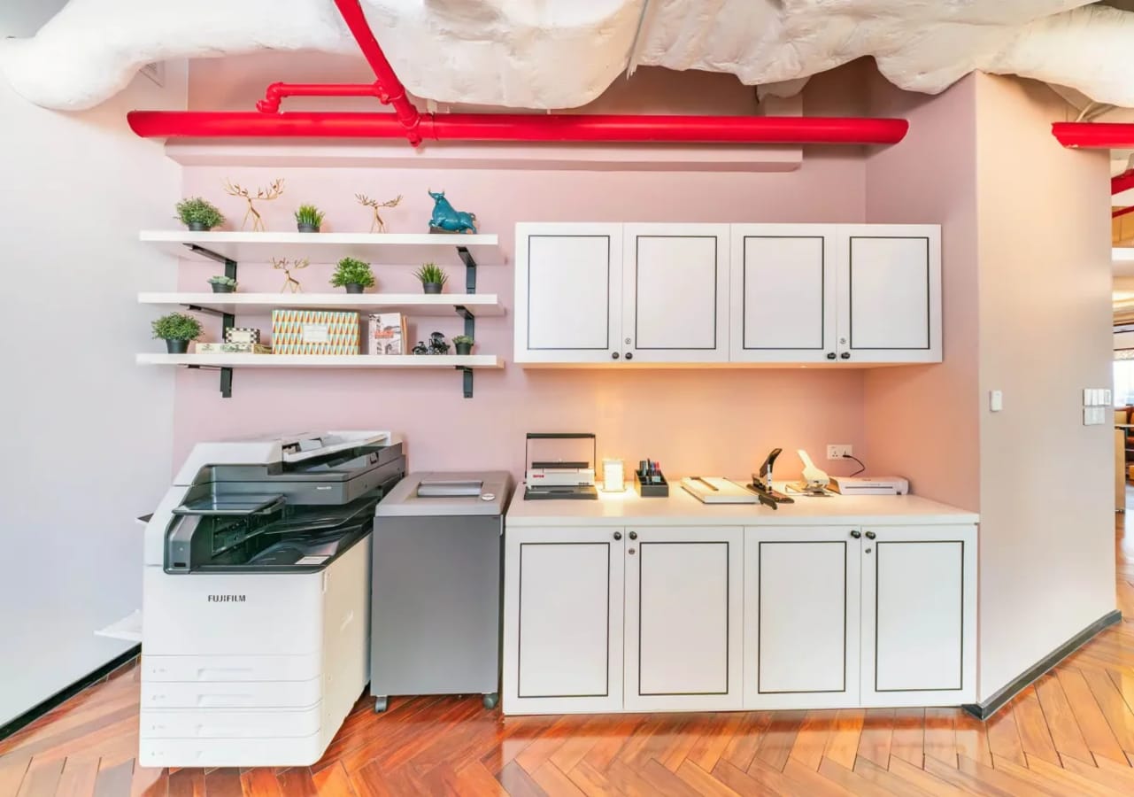 Modern coworking amenities with storage, decor, and printing facilities. Perfect for productivity.