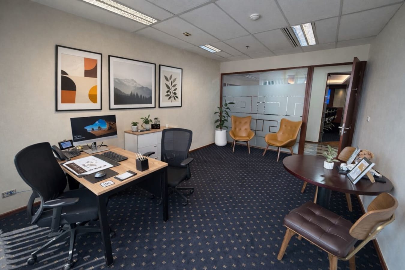 Stylish coworking space with modern decor and ample seating in Pathumwan. Ideal for productivity.