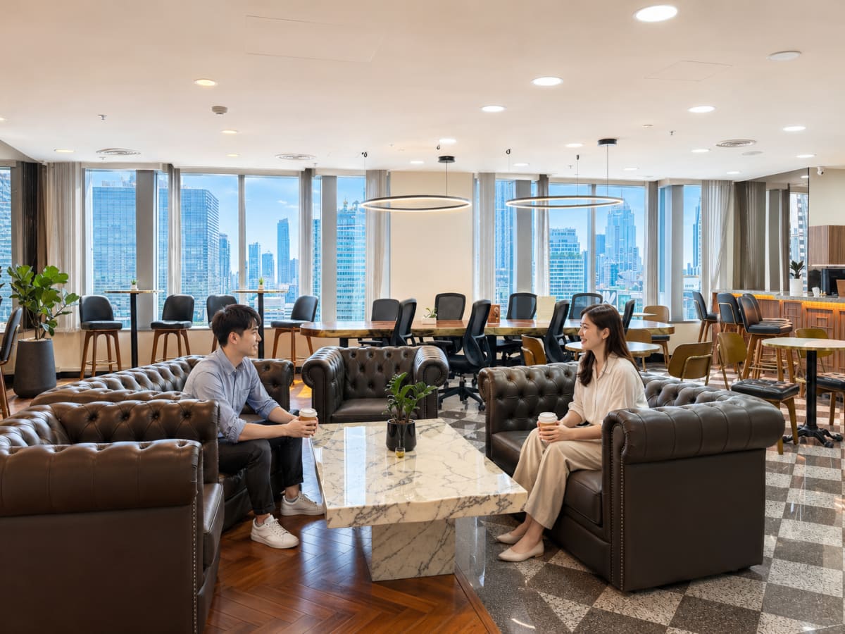 Modern coworking space with city views, elegant seating, and collaborative work areas.