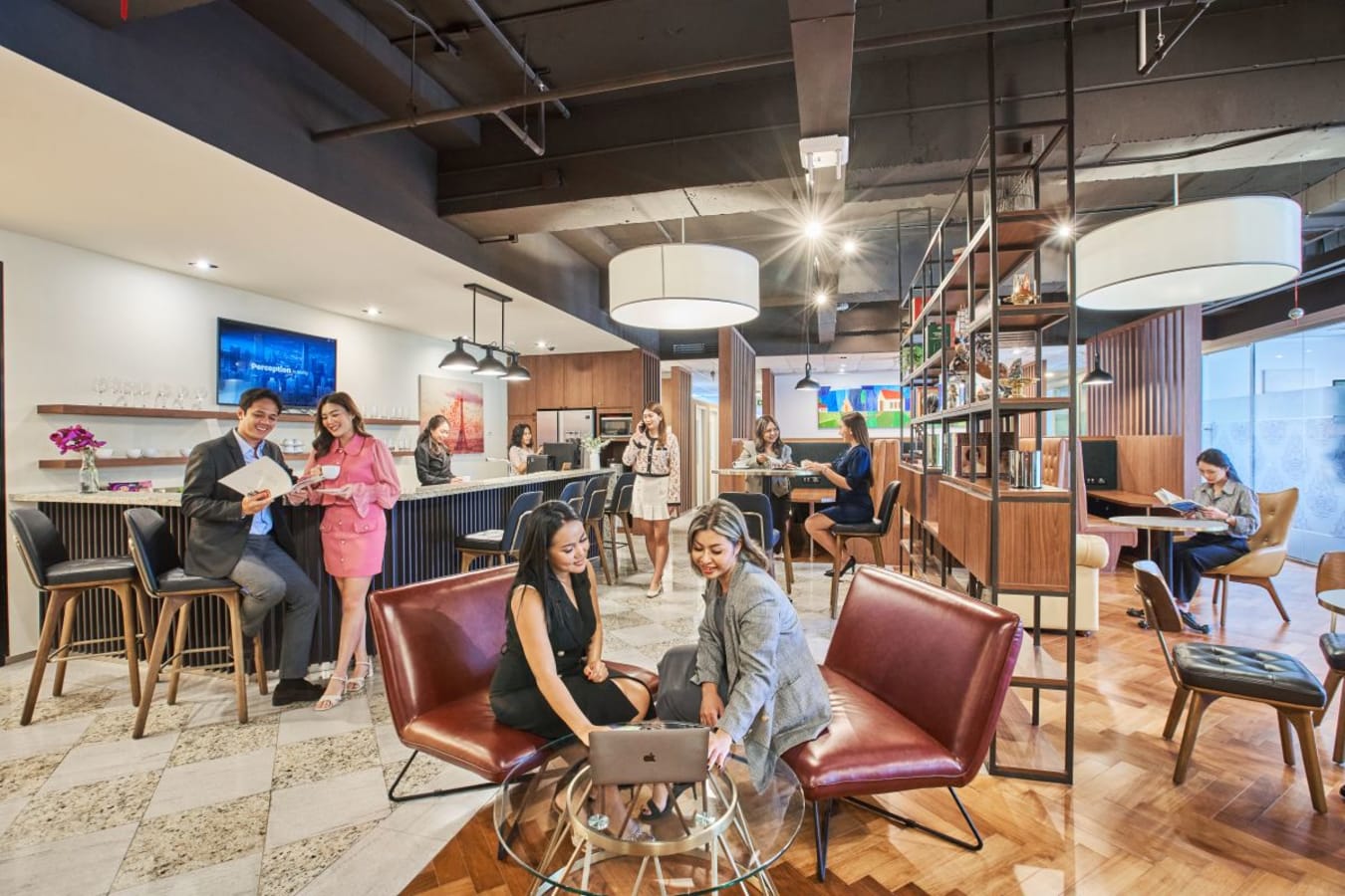 Vibrant coworking space with modern seating, collaborative areas, and a stylish lounge in Pathumwan.