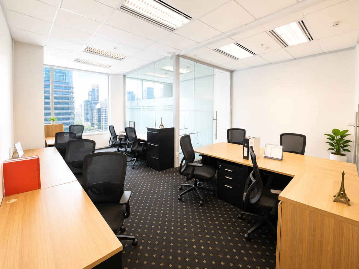Bright, flexible workspace with city views, ergonomic chairs, and modern furnishings in Pathumwan.