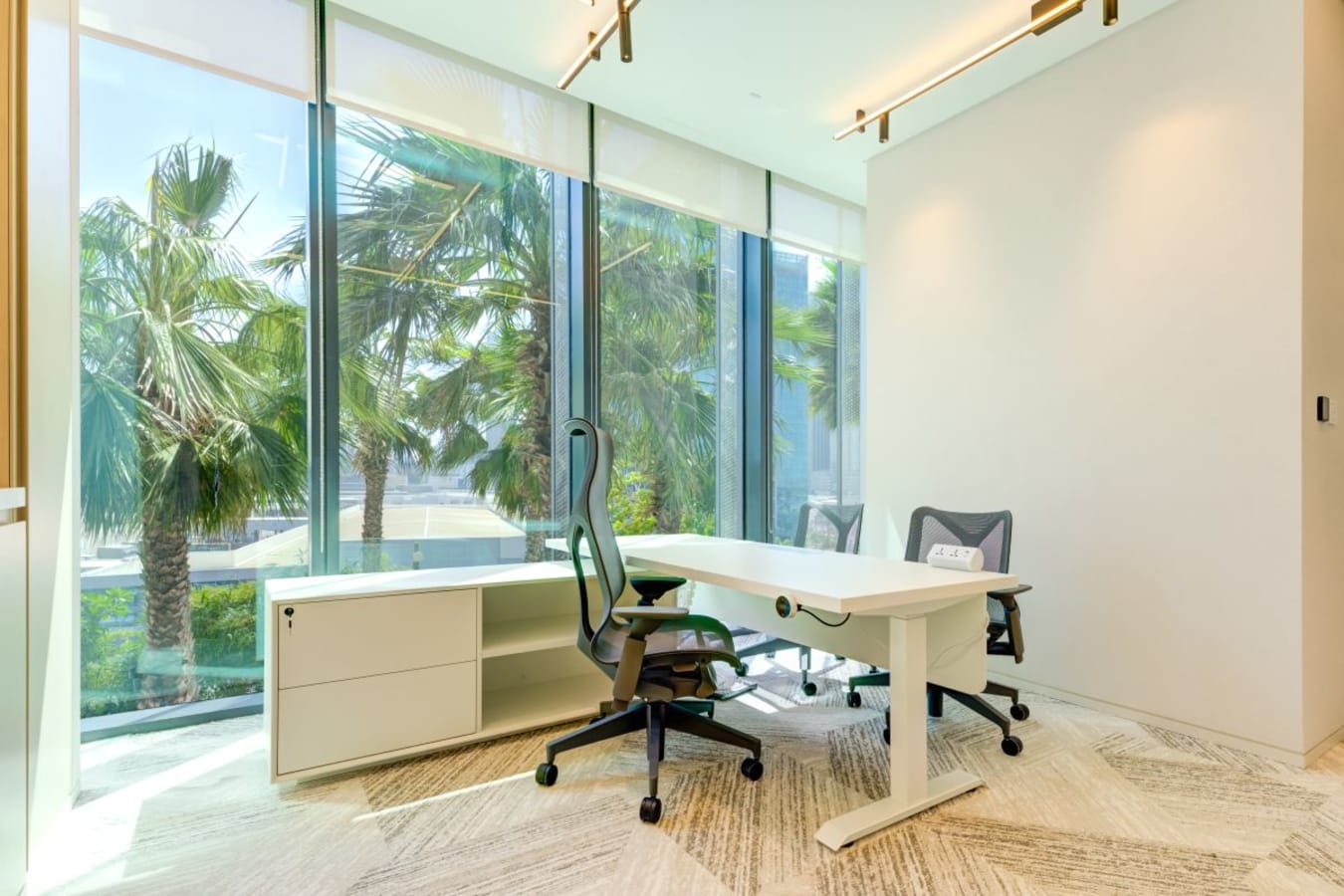 Bright, modern workspace with palm view in Za’abeel 1. Perfect for collaboration and productivity.