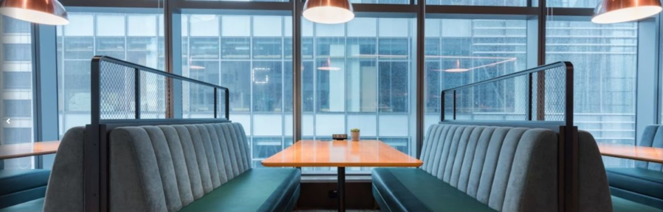 Modern coworking booths with natural light in Causeway Bay. Ideal for collaboration.