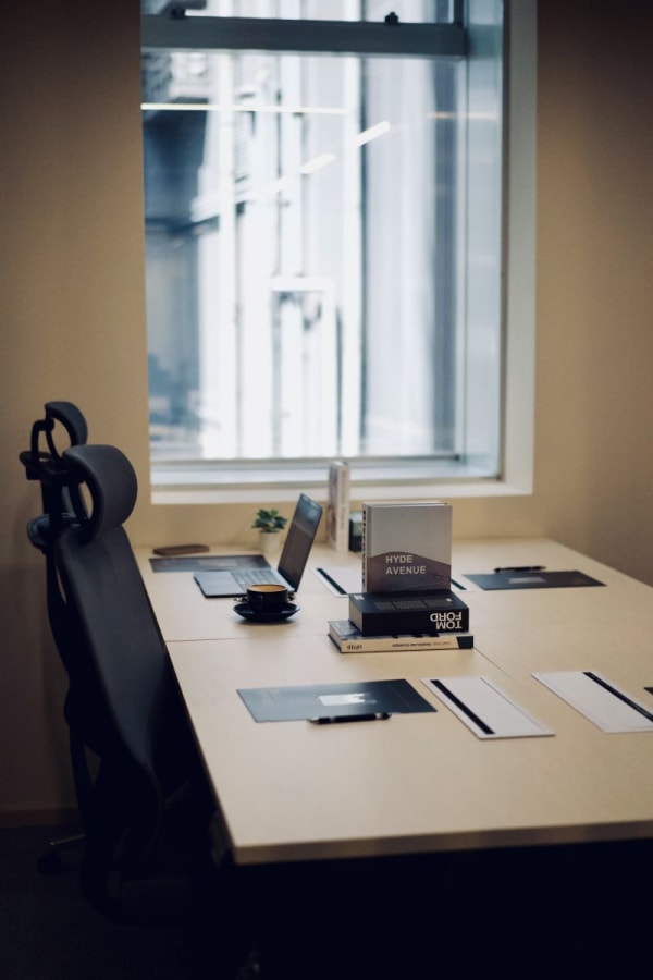 Modern coworking space with ergonomic chairs and ample natural light in Central Hong Kong.