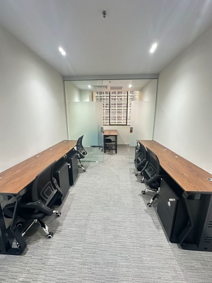 Modern coworking space with ergonomic chairs and ample desk area in Anson Road.