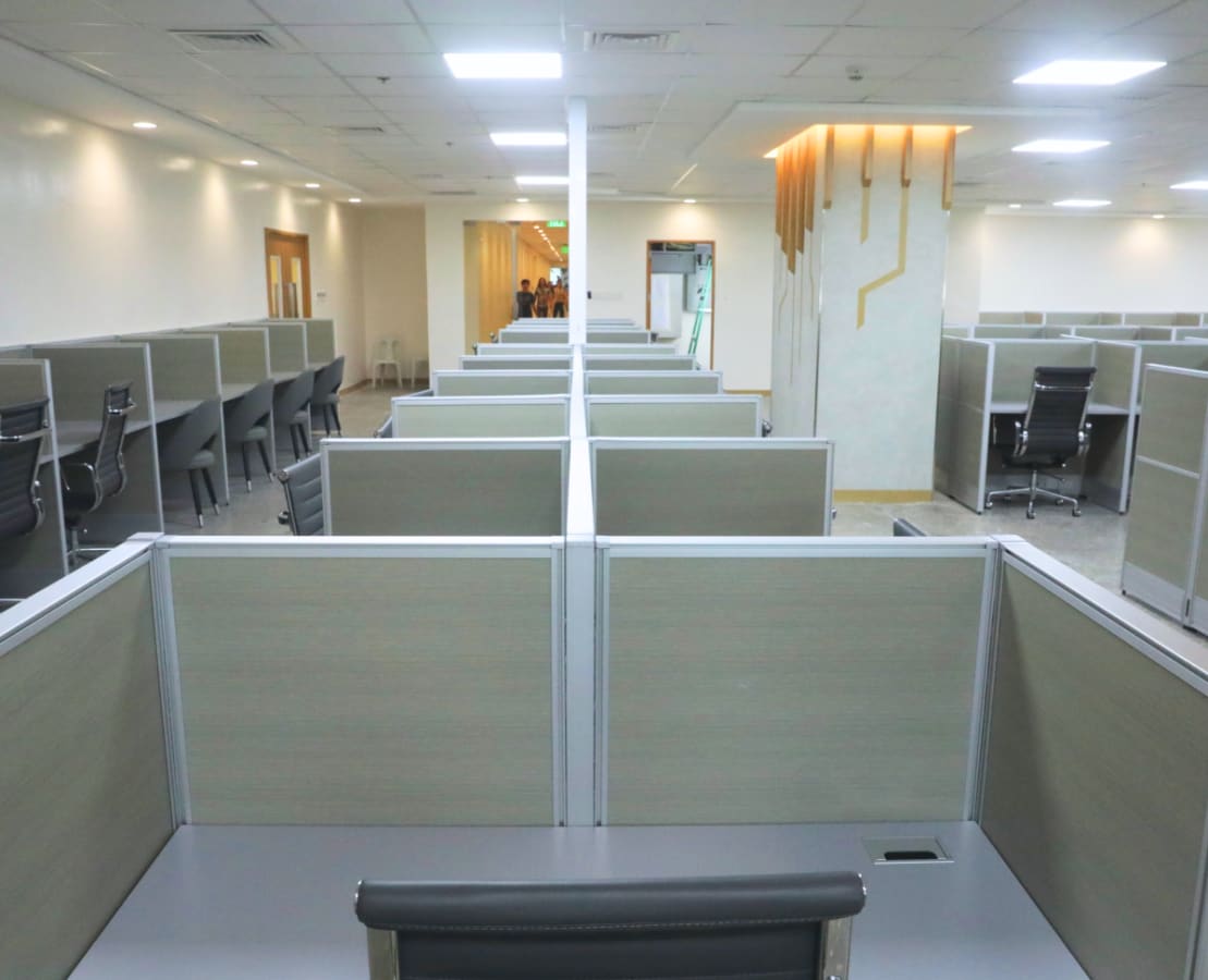 Spacious coworking space with modern cubicles and ergonomic chairs on Salinas Drive.