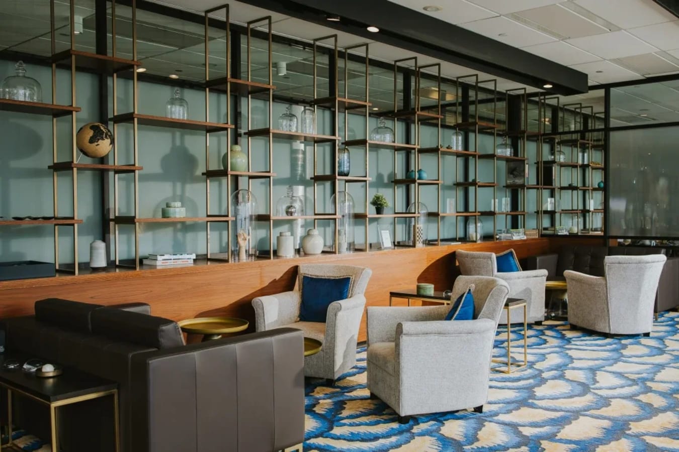 Stylish coworking lounge with modern decor and ample seating in vibrant Singapore.