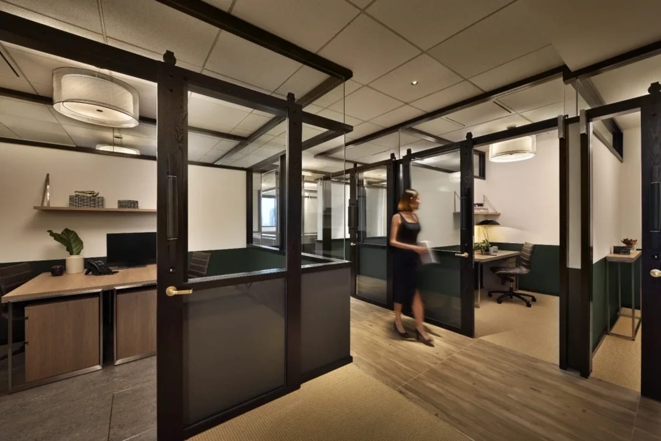 Modern coworking space with private offices and elegant furnishings in Orchard Road.