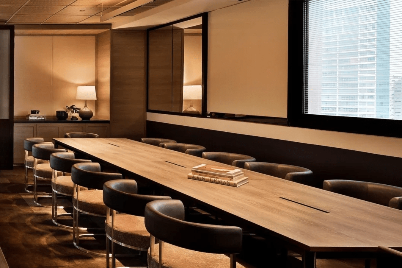 Sophisticated conference room with elegant seating and natural lighting in Orchard Road coworking space.