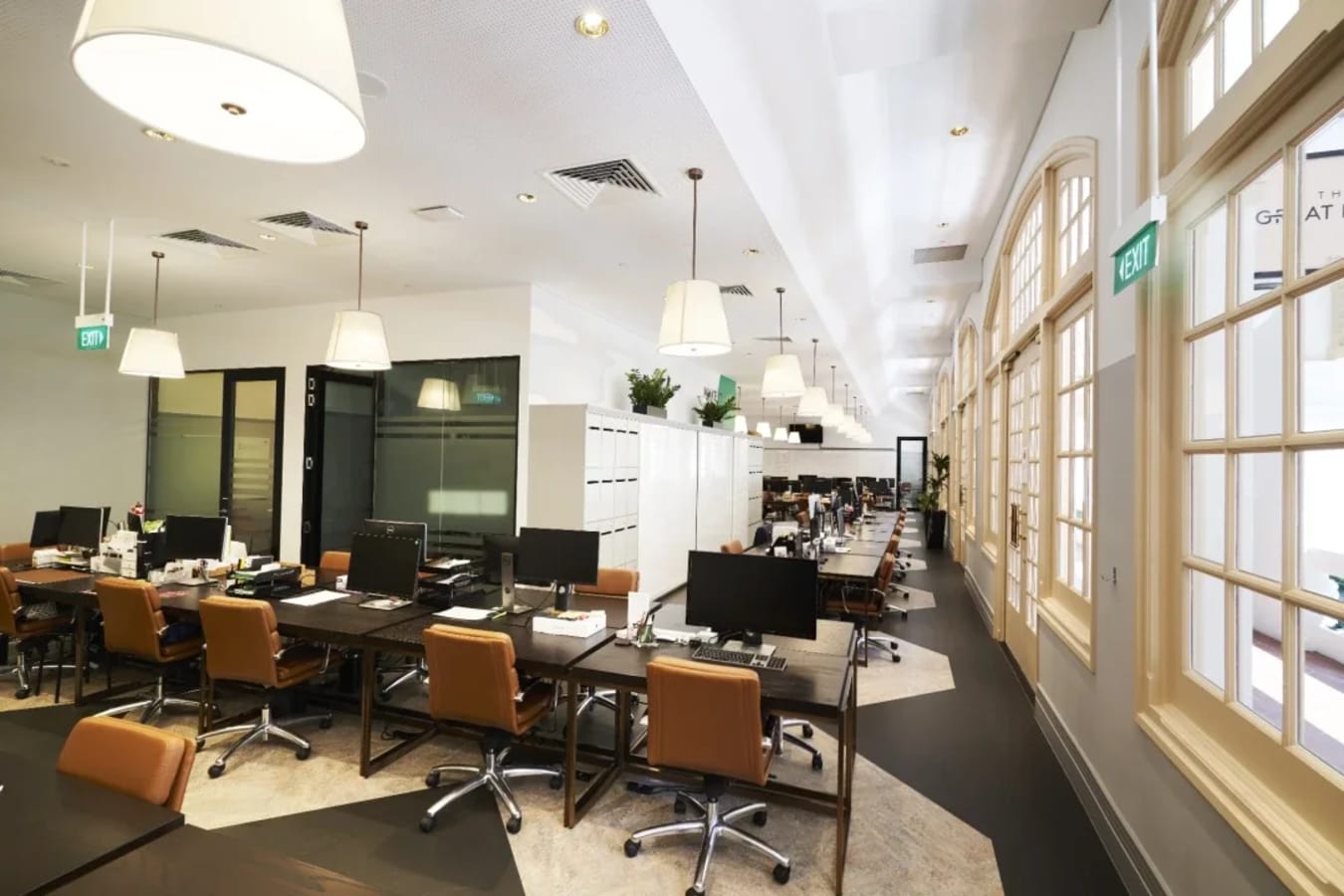 Bright, modern coworking space with natural light and flexible seating in Singapore.