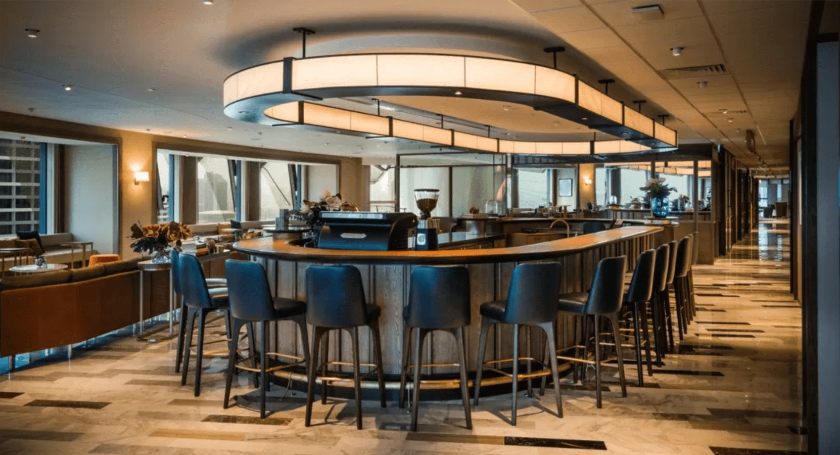 Sophisticated coworking space with modern bar seating in Downtown Core, Singapore.
