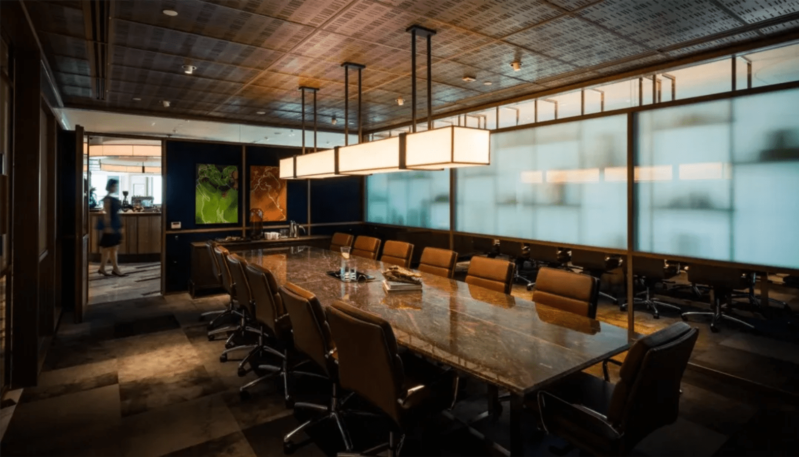 Sophisticated coworking space in Singapore with an elegant conference room and ambient lighting.