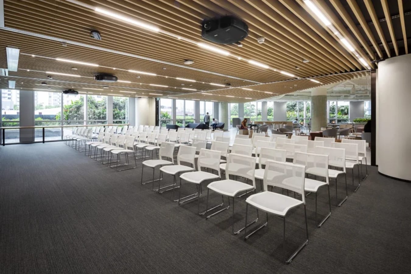 Spacious, modern event space with ample seating and natural light in a prime Singapore location.