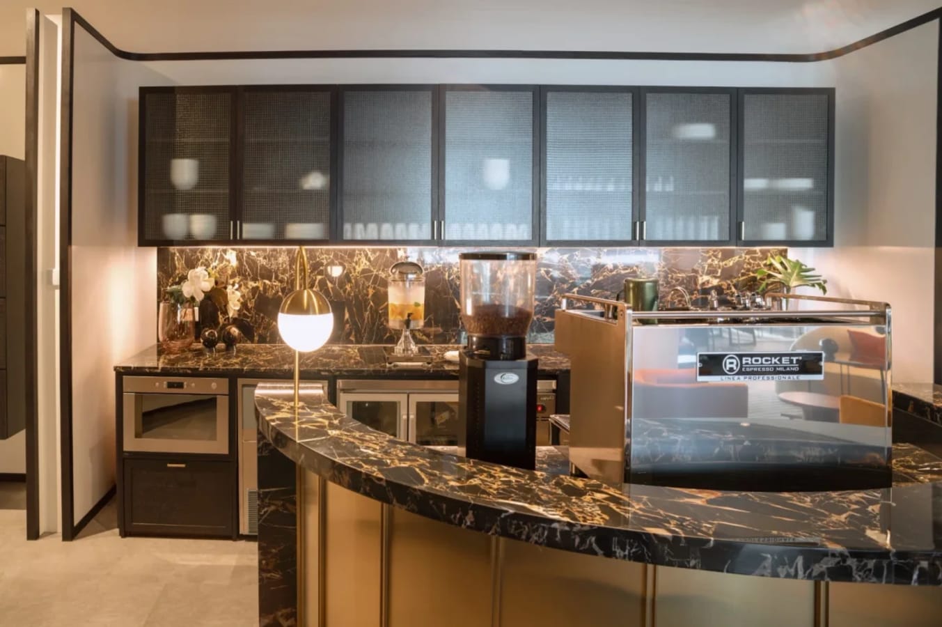 Sleek coworking kitchenette with marble accents and modern amenities on King’s Road.