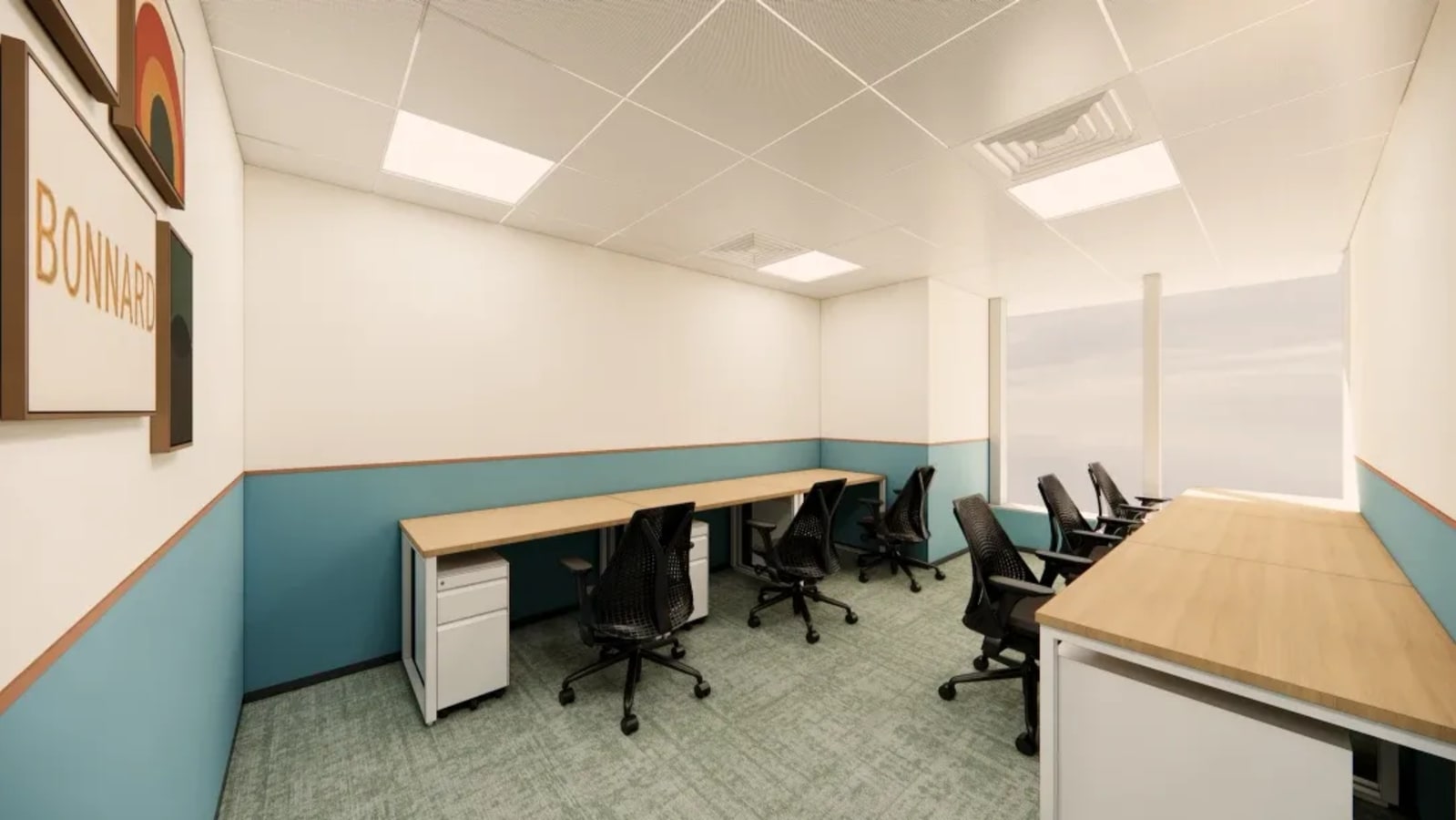 Modern coworking space with ample natural light and ergonomic seating for productivity.