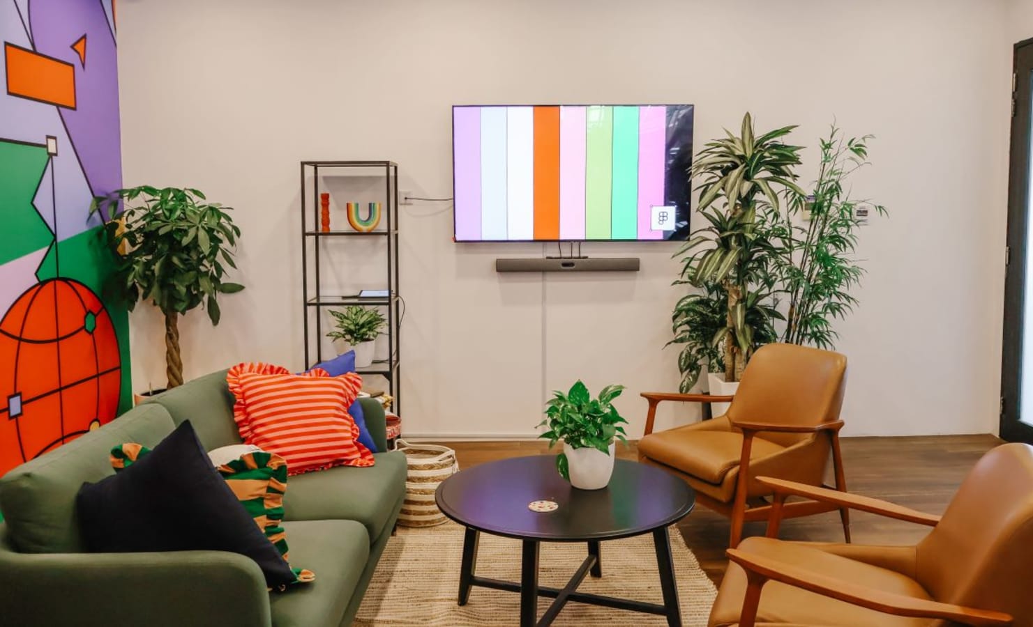 Modern coworking lounge with vibrant decor and comfortable seating in Neil Road, Singapore.