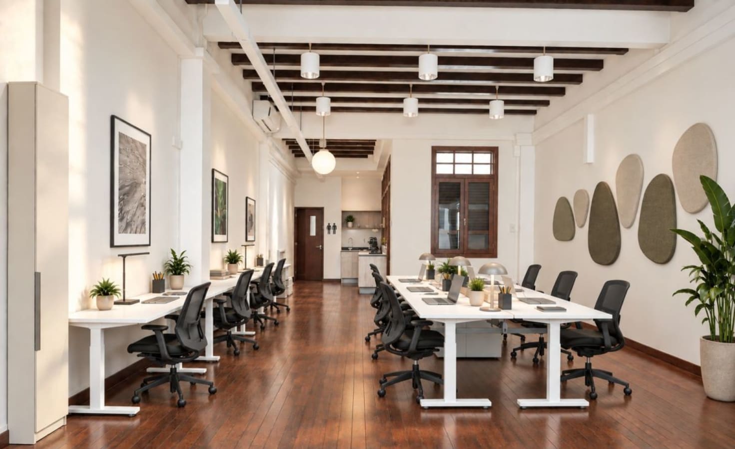 Bright, open coworking space with modern furnishings and natural accents in Telok Ayer Street.