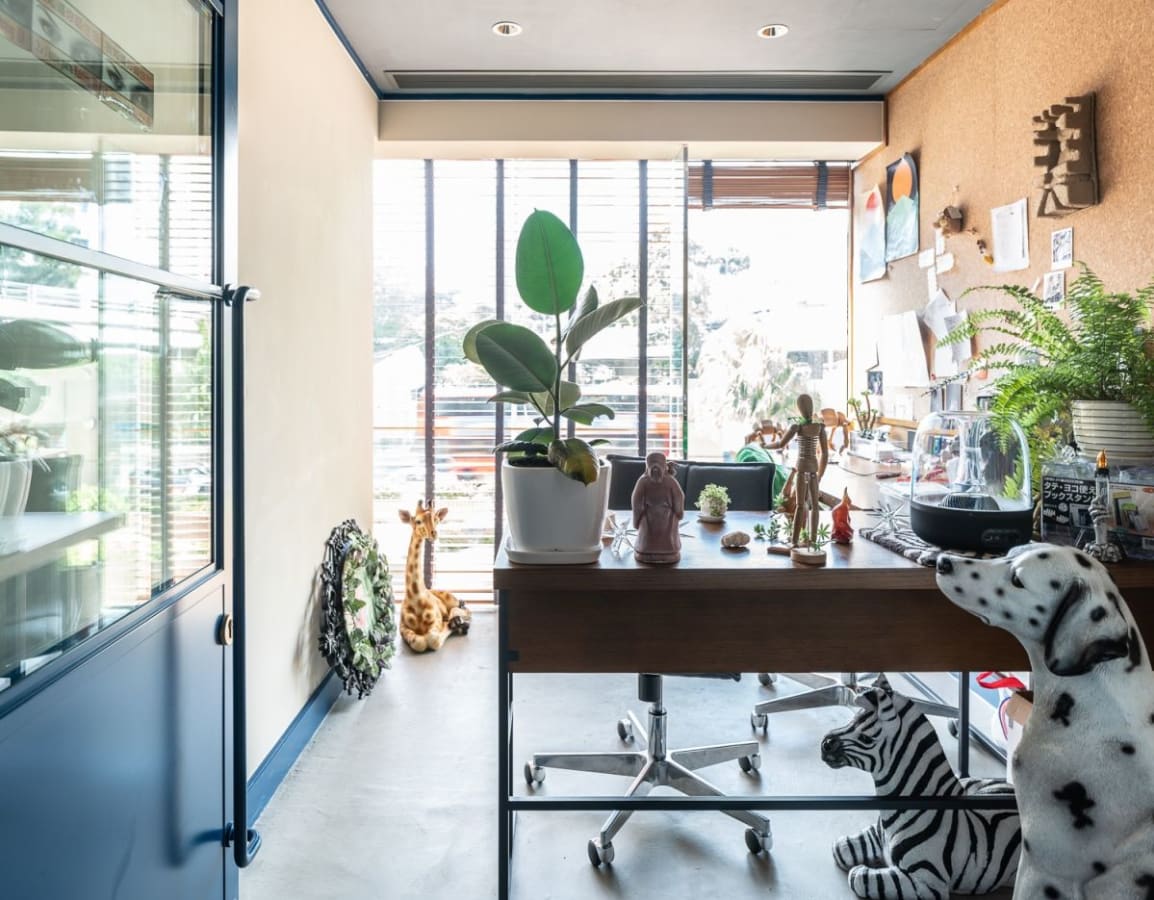 Bright and creative coworking space with natural light and eclectic decor on Nathan Road.