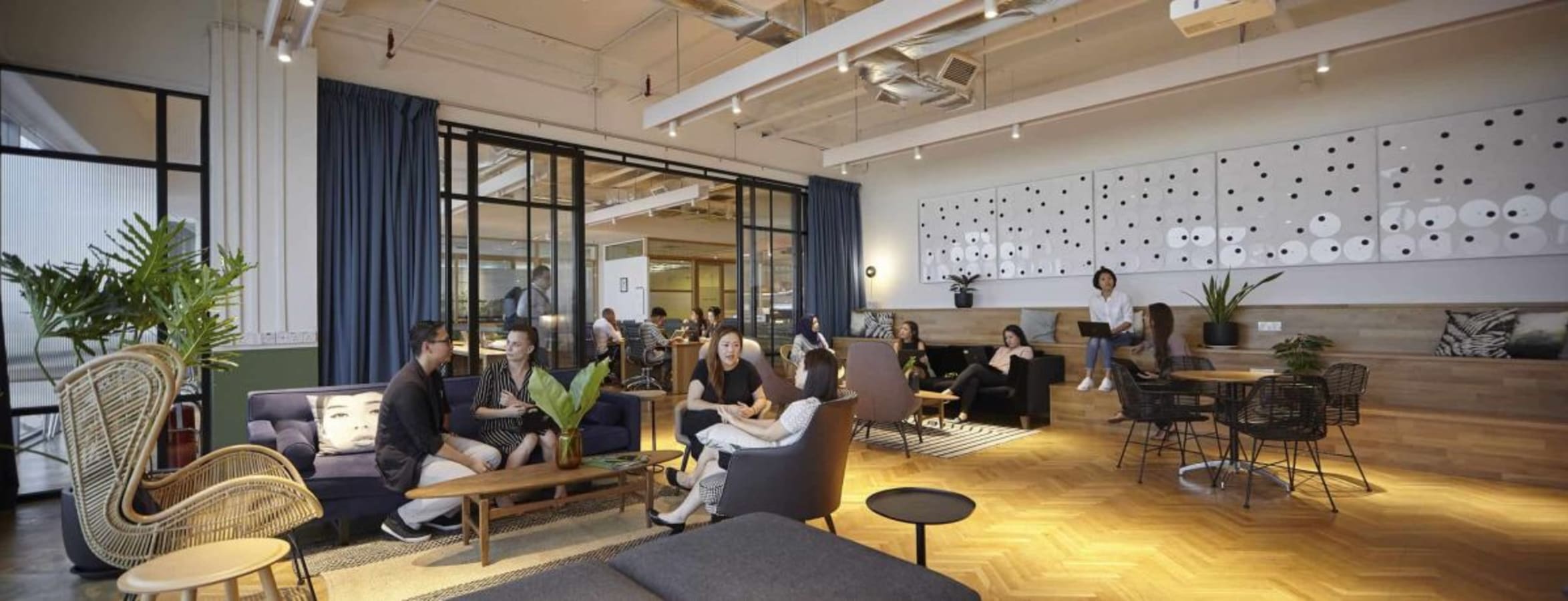 Stylish, open-plan coworking space with cozy seating and modern design in Changkat Semantan.