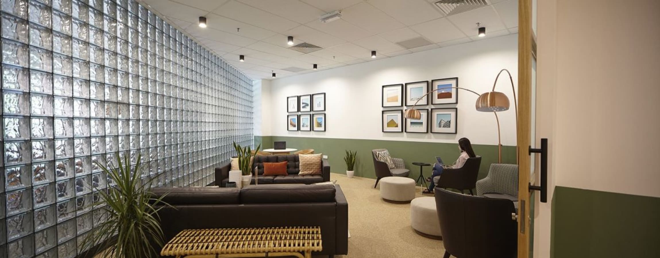 Modern coworking space with cozy seating, ambient lighting, and stylish decor in Selangor.