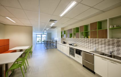 6 Person Open Plan Office with Internal Office and Large Windows
