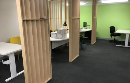 Sheltered cubicle permanent desks