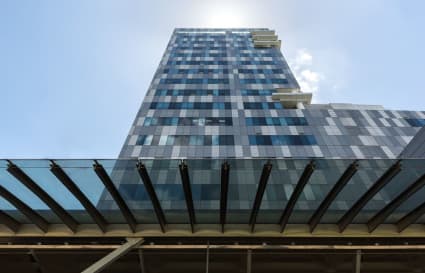 Sleek, modern facade of Fusionopolis Place—dynamic workspace in the heart of Singapore.