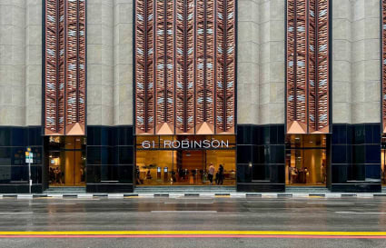 Flexible coworking space at 61 Robinson Road, featuring a modern facade and prime location.