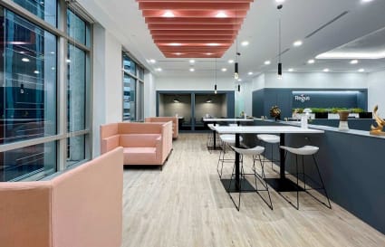 Bright coworking space on Robinson Road with modern seating and abundant natural light.