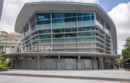 Modern coworking space at One Fullerton, featuring a sleek exterior and prime Singapore location.