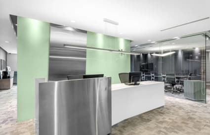 Modern coworking space in Tampines with sleek design, open layout, and vibrant accents.