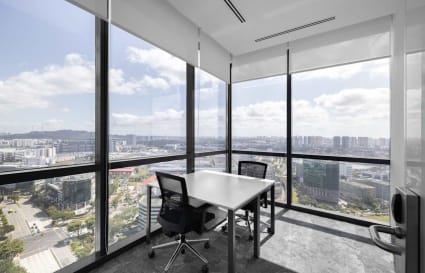Bright corner office with panoramic city views and modern furnishings in Venture Drive, Singapore.