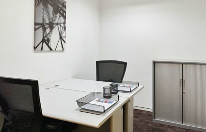 Modern coworking space with sleek desks, ergonomic chairs, and ample storage on Biliran Road.