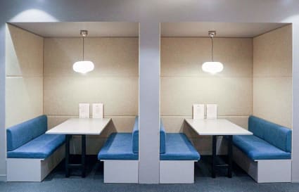 Stylish booth seating perfect for collaborative work or informal meetings.