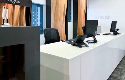 Sleek, modern coworking area with ergonomic chairs and advanced workstations in Estrella, Metro Manila.