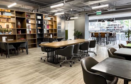 Modern coworking space with versatile seating, natural light, and a sleek open layout on North Bridge Road.