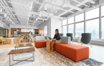 Bright, modern coworking space with flexible seating and city views on Hennessy Road.
